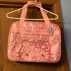 Sanrio Hello Kitty Luggage. NWT. Lightweight poly material.
